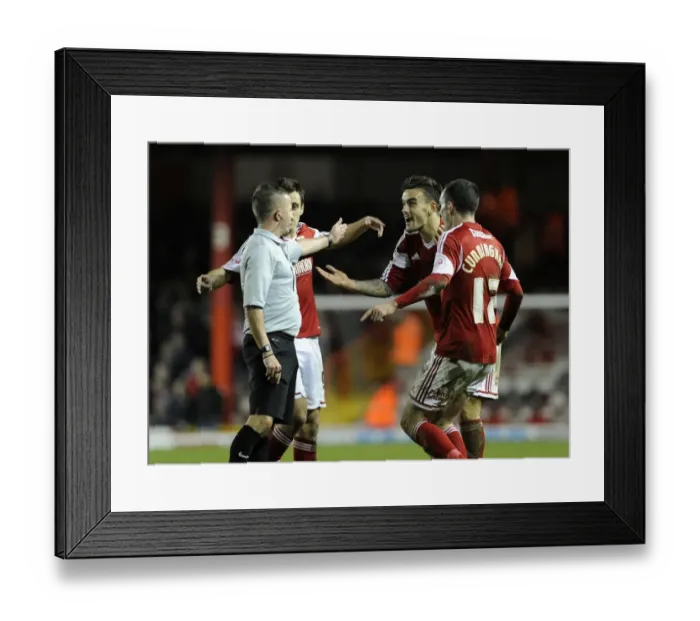 Framed Print : Bristol City Players Protest Referee Decisions During Match Against Walsall