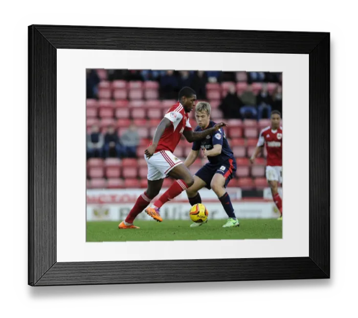 Framed Print : Intense Rivalry: A Football Battle – Jay Emmanuel-Thomas vs. Nicky Featherstone, Bristol City vs. Walsall, Sky Bet League One