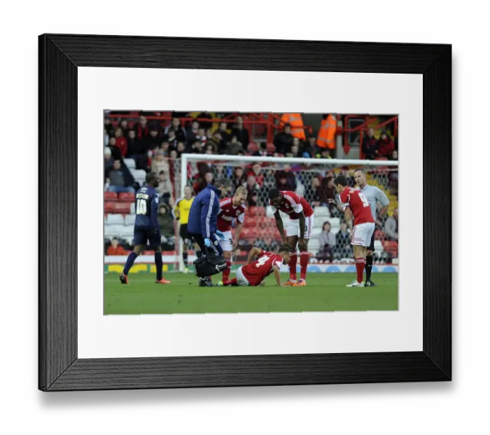 Framed Print : Bristol City's Bobby Reid Suffers Injury in Bristol City v Walsall Match, 26 / 12 / 2013