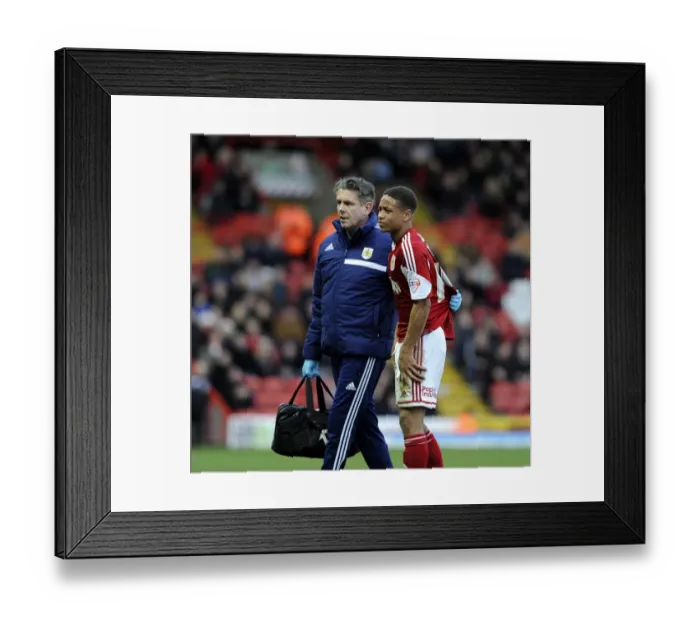 Framed Print : Bristol City's Bobby Reid Suffers Injury and Exits Field Against Walsall (December 2013)