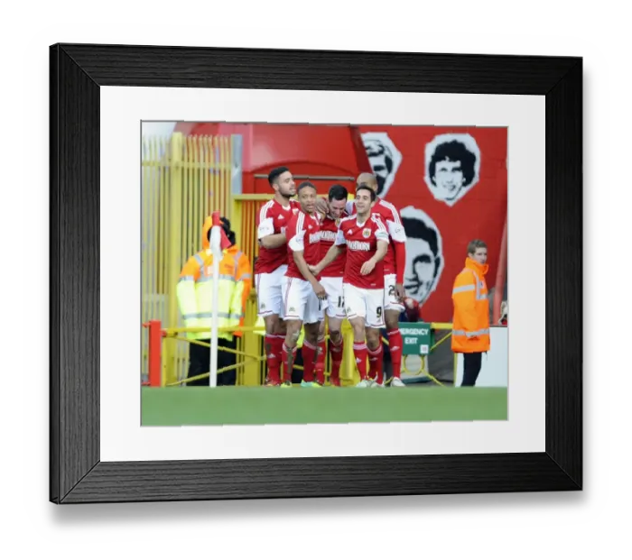 Framed Print : Bristol City Celebrate: Greg Cunningham's Goal vs Stevenage (December 2013) Framed Print : Bristol City Celebrate: Greg Cunningham's Goal vs Stevenage (December 2013)