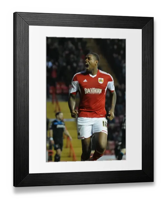 Framed Print : Thrilling Goal: Jay Emmanuel-Thomas's Euphoric Celebration in Bristol City's Sky Bet League One Victory over Stevenage (December 2013)