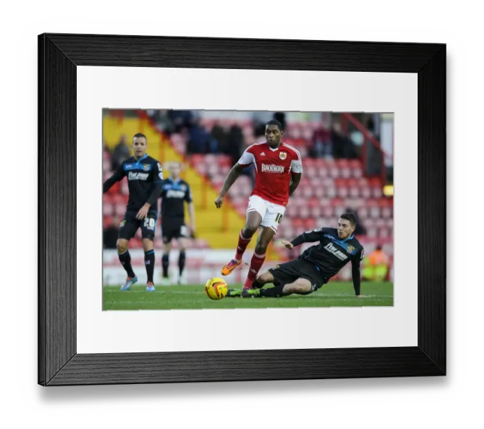 Framed Print : Bristol City vs Stevenage: Jay Emmanuel-Thomas vs Sam Wedgbury - Intense Midfield Battle