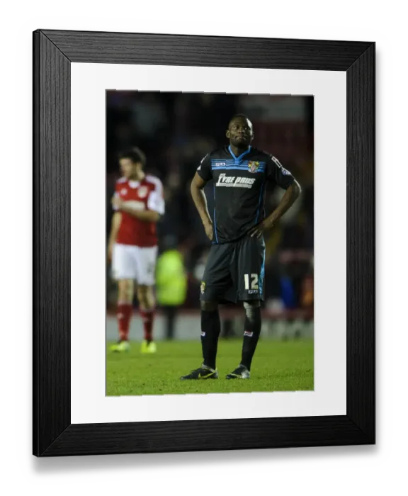 Framed Print : Dejected Francois Zoko of Stevenage After 4-1 Loss Against Bristol City Framed Print : Dejected Francois Zoko of Stevenage After 4-1 Loss Against Bristol City