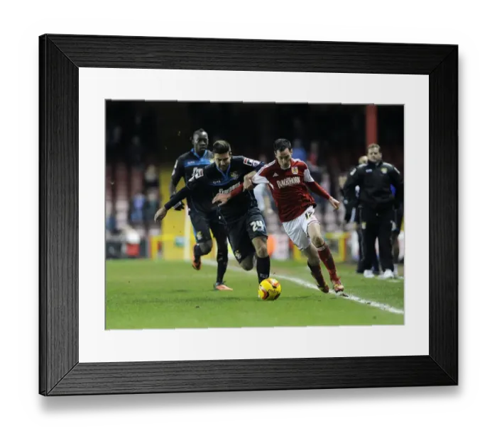 Framed Print : Bristol City vs Stevenage: Intense Moment as Greg Cunningham is Challenged by Michael Doughty