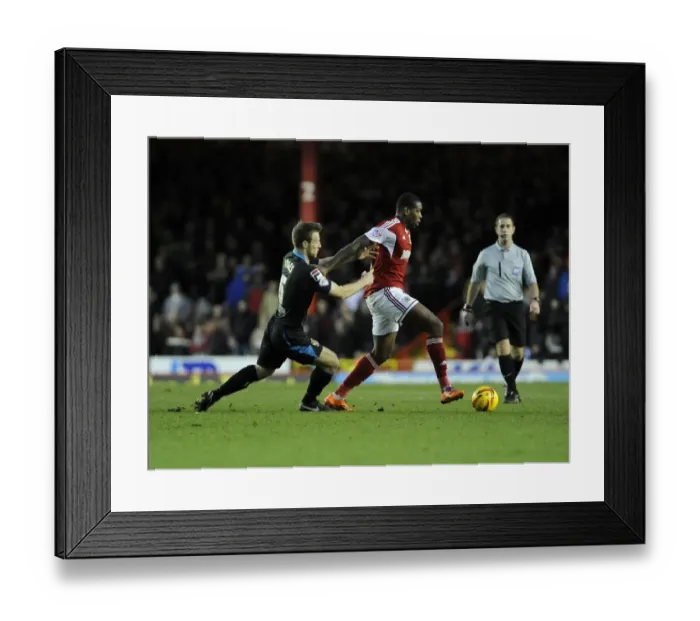 Framed Print : Bristol City's Jay Emmanuel-Thomas Fends Off Luke Jones in Sky Bet League One Clash Framed Print : Bristol City's Jay Emmanuel-Thomas Fends Off Luke Jones in Sky Bet League One Clash