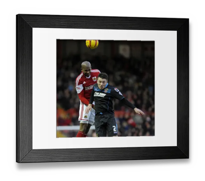 Framed Print : Bristol City vs Stevenage: Intense Aerial Battle Between Marvin Elliott and Sam Wedgbury Framed Print : Bristol City vs Stevenage: Intense Aerial Battle Between Marvin Elliott and Sam Wedgbury