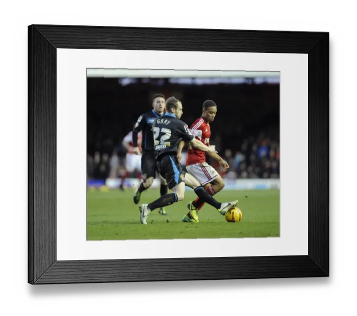 Framed Print : Bristol City's Bobby Reid Tackled by Stevenage's David Gray during Sky Bet League One Match Framed Print : Bristol City's Bobby Reid Tackled by Stevenage's David Gray during Sky Bet League One Match