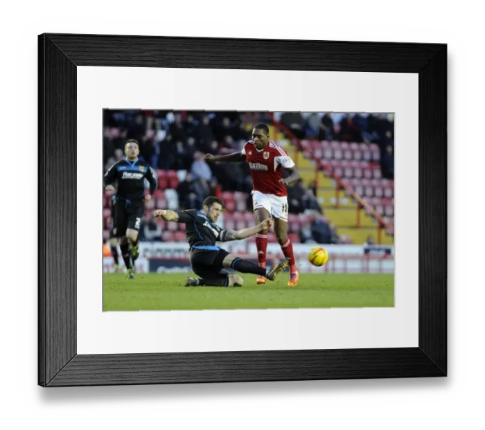 Framed Print : Bristol City vs Stevenage: Jay Emmanuel-Thomas Tackled in Sky Bet League One Clash