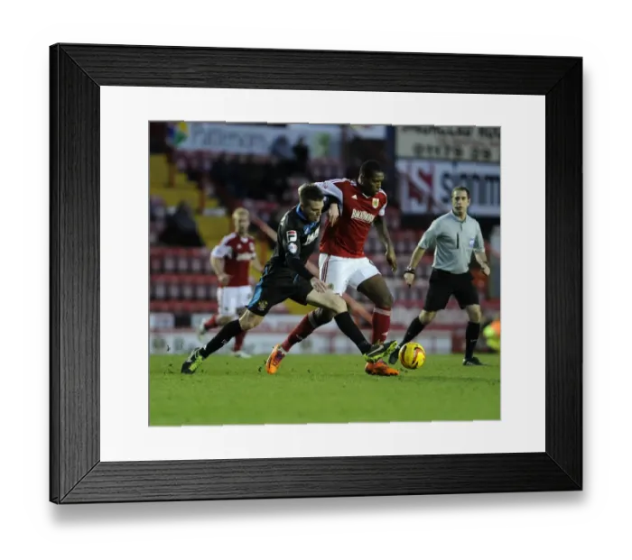 Framed Print : Intense Sky Bet League One Clash: Jay Emmanuel-Thomas Tackled by Opponent at Ashton Gate Framed Print : Intense Sky Bet League One Clash: Jay Emmanuel-Thomas Tackled by Opponent at Ashton Gate
