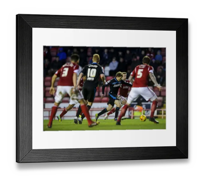 Framed Print : Luke Freeman Breaks Through: Intense Moment from Bristol City vs. Stevenage (December 2013)