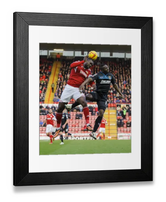 Framed Print : Intense Aerial Battle: Osborne vs Zoko in Sky Bet League One Clash Framed Print : Intense Aerial Battle: Osborne vs Zoko in Sky Bet League One Clash