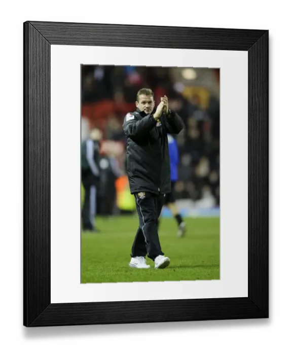 Framed Print : Graham Westley Consoles Stevenage Fans After Disappointing 4-1 Loss to Bristol City