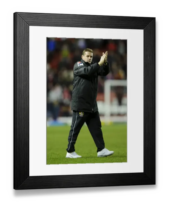 Framed Print : Graham Westley Consoles Disappointed Stevenage Fans After 4-1 Defeat by Bristol City Framed Print : Graham Westley Consoles Disappointed Stevenage Fans After 4-1 Defeat by Bristol City