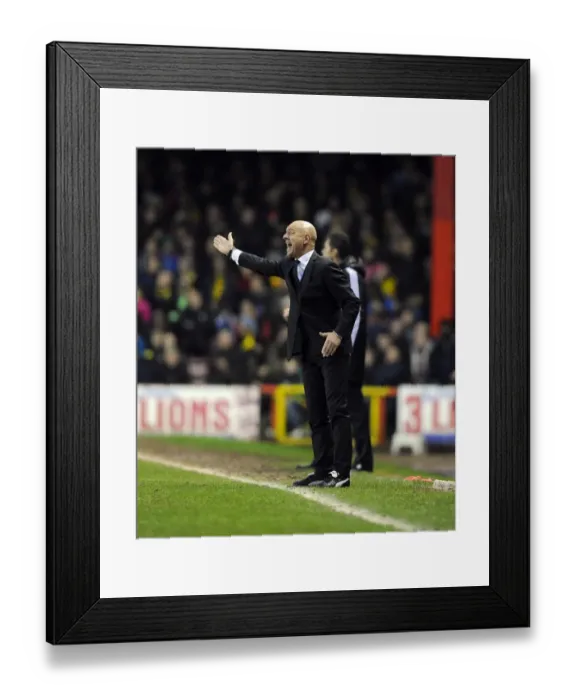 Framed Print : Unconventional Manager Giuseppe Sannino of Watford: Football Boots and Suit at Ashton Gate