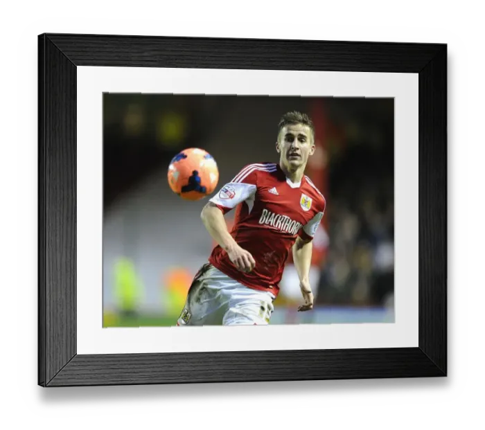 Framed Print : Bristol City vs Watford: Joe Bryan's Determination - FA Cup Third Round Clash at Ashton Gate Framed Print : Bristol City vs Watford: Joe Bryan's Determination - FA Cup Third Round Clash at Ashton Gate