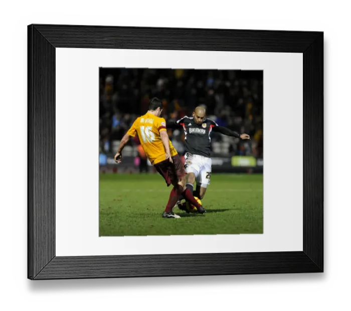 Framed Print : Intense Rivalry: Marvin Elliott vs. Carl McHugh in Sky Bet League One Clash at Bradford City
