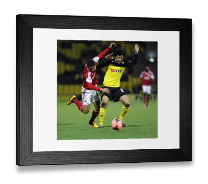 Framed Print : Watford's Iriney Fouls Bobby Reid in FA Cup Third Round Replay: Watford v Bristol City (14 / 01 / 2014)
