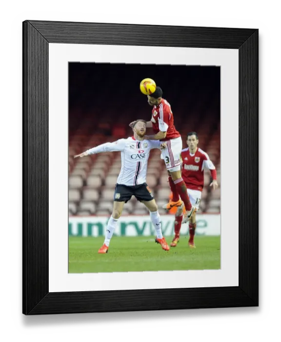 Framed Print : Battling for Supremacy: Derrick Williams vs. Dean Bowditch in Bristol City vs. MK Dons Football Match Framed Print : Battling for Supremacy: Derrick Williams vs. Dean Bowditch in Bristol City vs. MK Dons Football Match