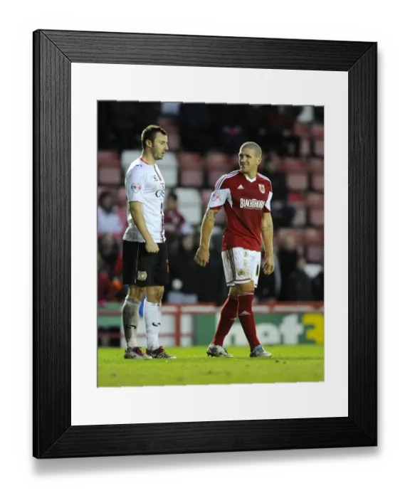 Framed Print : Bristol City: A Light-Hearted Moment Between Rivals El-Abd and Carruthers during Bristol City vs MK Dons Framed Print : Bristol City: A Light-Hearted Moment Between Rivals El-Abd and Carruthers during Bristol City vs MK Dons