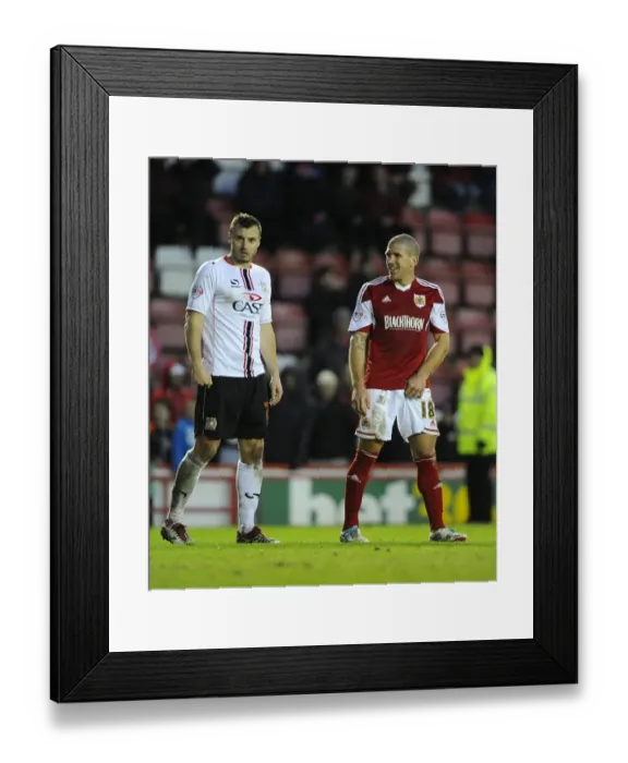 Framed Print : Bristol City: El-Abd and Carruthers Share a Laugh Amidst League One Rivalry Framed Print : Bristol City: El-Abd and Carruthers Share a Laugh Amidst League One Rivalry