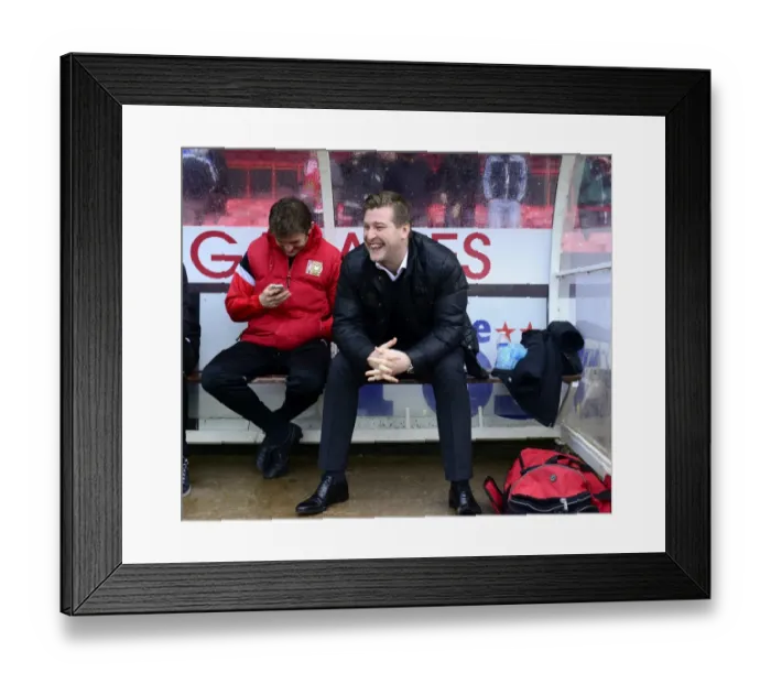 Framed Print : Karl Robinson and MK Dons Bench Share a Light-Hearted Moment Before Bristol City Clash Framed Print : Karl Robinson and MK Dons Bench Share a Light-Hearted Moment Before Bristol City Clash
