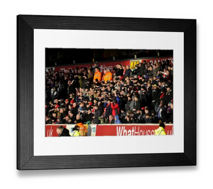 Framed Print : Bristol City Fans Shield Their Eyes from the Sun at Molineux Stadium during Wolverhampton Wanderers vs. Bristol City, Sky Bet League One Match (January 2014) Framed Print : Bristol City Fans Shield Their Eyes from the Sun at Molineux Stadium during Wolverhampton Wanderers vs. Bristol City, Sky Bet League One Match (January 2014)