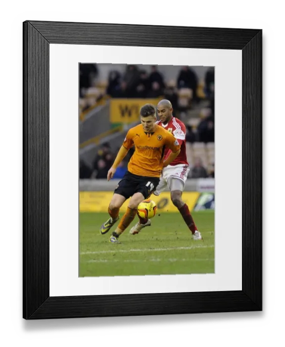 Framed Print : Bristol City's Marvin Elliott Closes In on Wolverhampton Wanderers Lee Evans in Sky Bet League One Clash Framed Print : Bristol City's Marvin Elliott Closes In on Wolverhampton Wanderers Lee Evans in Sky Bet League One Clash