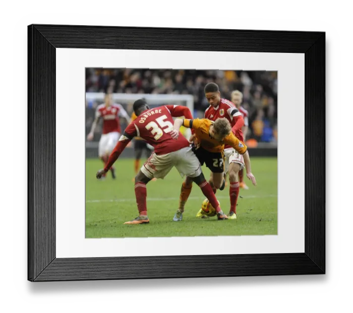 Framed Print : Bristol City's Osborne and Reid Tackle Michael Jacobs in Wolves vs. Bristol City Football Match, Sky Bet League One Framed Print : Bristol City's Osborne and Reid Tackle Michael Jacobs in Wolves vs. Bristol City Football Match, Sky Bet League One