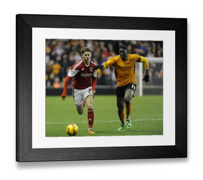 Framed Print : Wes Burns vs Bakary Sako: Intense Battle at Molineux Stadium - Wolves vs Bristol City, Sky Bet League One