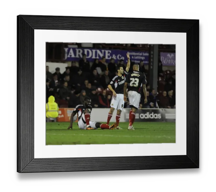 Framed Print : Bristol City's Karleigh Osborne Scores and Suffers Injury vs. Brentford (January 2014) Framed Print : Bristol City's Karleigh Osborne Scores and Suffers Injury vs. Brentford (January 2014)