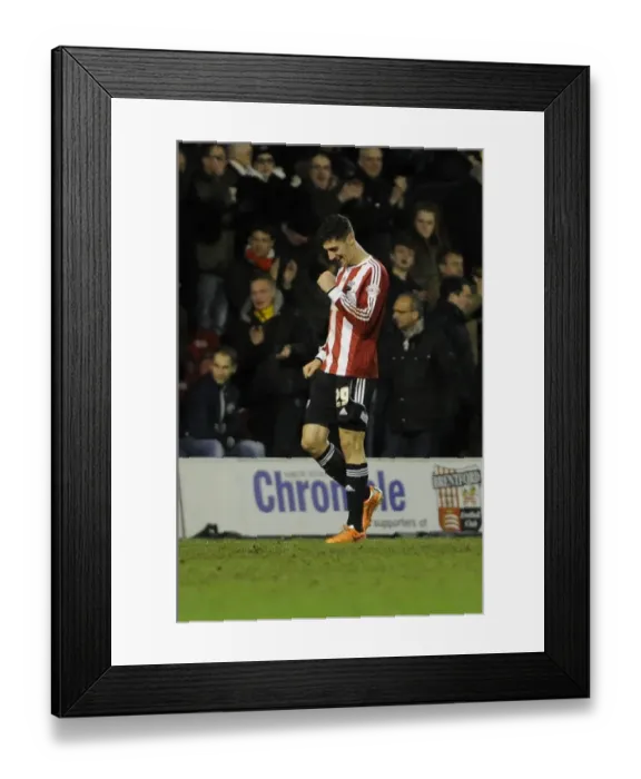 Framed Print : Thrilling Moment: Marcello Trotta's Goal Celebration for Bristol City in Brentford Clash, January 2014