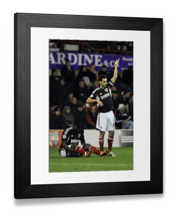 Framed Print : Bristol City: Sam Baldock Consoles Injured Karleigh Osborne during Brentford Clash, January 2014 Framed Print : Bristol City: Sam Baldock Consoles Injured Karleigh Osborne during Brentford Clash, January 2014