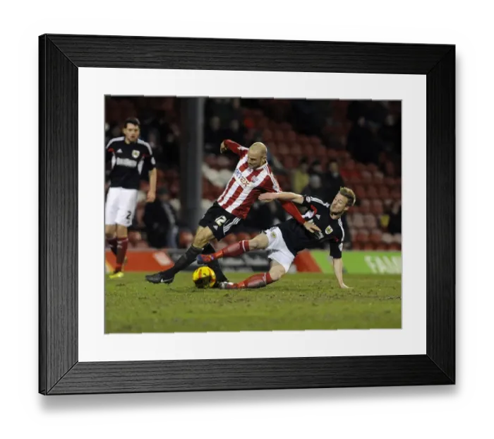 Framed Print : Wade Elliott Fouls Alan McCormack: Intense Moment from Brentford vs. Bristol City, Sky Bet League One (January 2014) Framed Print : Wade Elliott Fouls Alan McCormack: Intense Moment from Brentford vs. Bristol City, Sky Bet League One (January 2014)