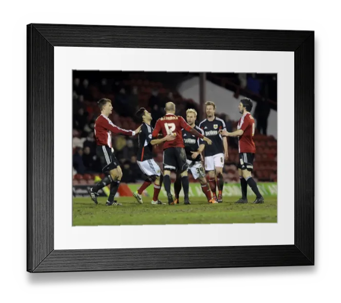 Framed Print : Brentford vs. Bristol City: Intense Moment Between McCormack and Elliott Framed Print : Brentford vs. Bristol City: Intense Moment Between McCormack and Elliott