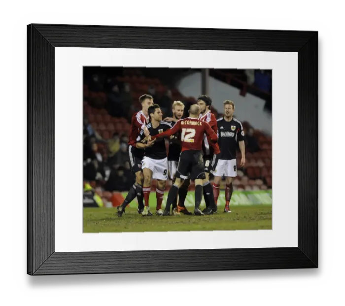 Framed Print : Intense Rivalry: McCormack vs. Elliott Clash at Brentford - Football's Fiery Moment between Wade Elliott and Alan McCormack Framed Print : Intense Rivalry: McCormack vs. Elliott Clash at Brentford - Football's Fiery Moment between Wade Elliott and Alan McCormack