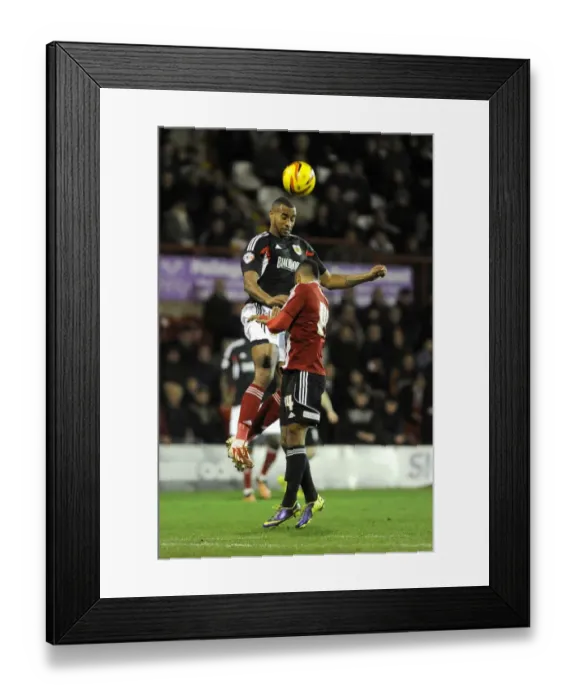 Framed Print : Tyrone Barnett Wins a Header for Bristol City against Brentford, Sky Bet League One, 2014