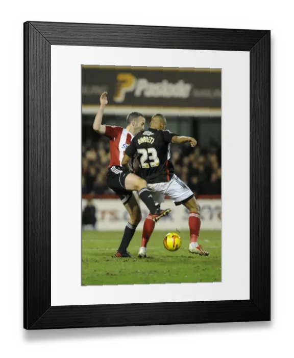 Framed Print : Brentford vs. Bristol City: Tyrone Barnett vs. Kevin O'Connor Clash in Sky Bet League One