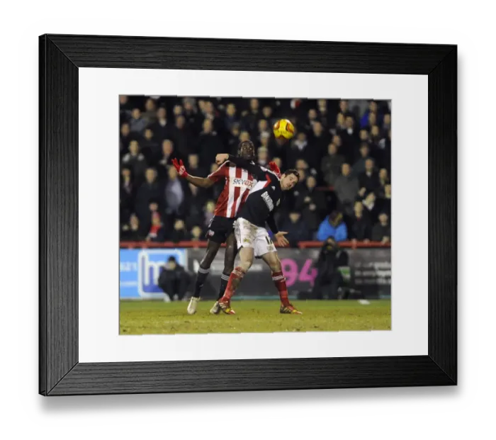 Framed Print : Brentford vs. Bristol City: Intense Battle for the Ball between Clayton Donaldson and Greg Cunningham Framed Print : Brentford vs. Bristol City: Intense Battle for the Ball between Clayton Donaldson and Greg Cunningham