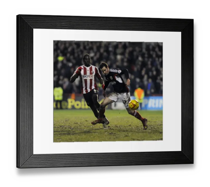 Framed Print : Brentford's Clayton Donaldson Stops Greg Cunningham of Bristol City, January 2014 Framed Print : Brentford's Clayton Donaldson Stops Greg Cunningham of Bristol City, January 2014