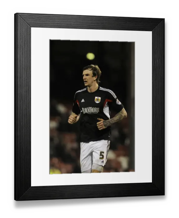 Framed Print : Aden Flint of Bristol City in Action at Brentford's Griffin Park, 2014 - Football Image Framed Print : Aden Flint of Bristol City in Action at Brentford's Griffin Park, 2014 - Football Image