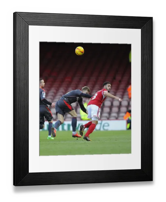 Framed Print : Intense Sky Bet League One Clash: Derrick Williams Tackles Brad Potts