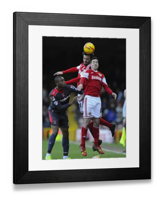 Framed Print : Maron Pack vs. David Amoo: Intense Aerial Battle at Ashton Gate - Bristol City vs. Carlisle United, Sky Bet League One Framed Print : Maron Pack vs. David Amoo: Intense Aerial Battle at Ashton Gate - Bristol City vs. Carlisle United, Sky Bet League One