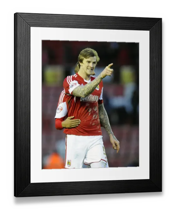 Framed Print : Aden Flint's Celebration: Bristol City Secures Victory over Carlisle United Framed Print : Aden Flint's Celebration: Bristol City Secures Victory over Carlisle United