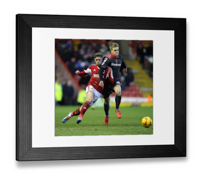 Framed Print : Bristol City's Wes Burns vs Carlisle United's Brad Potts: A Football Rivalry in Sky Bet League One (January 2014) Framed Print : Bristol City's Wes Burns vs Carlisle United's Brad Potts: A Football Rivalry in Sky Bet League One (January 2014)