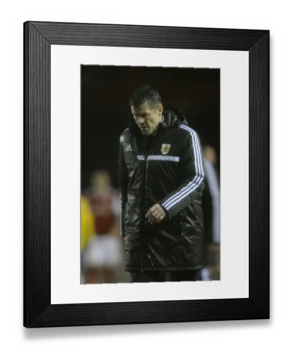 Framed Print : Dejected Steve Cotterill Leaves Ashton Gate After Bristol City's Loss to Coventry City