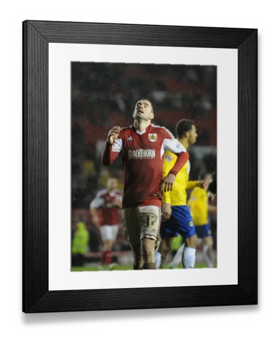 Framed Print : Dejected Greg Cunningham: Bristol City's Loss to Coventry City Framed Print : Dejected Greg Cunningham: Bristol City's Loss to Coventry City