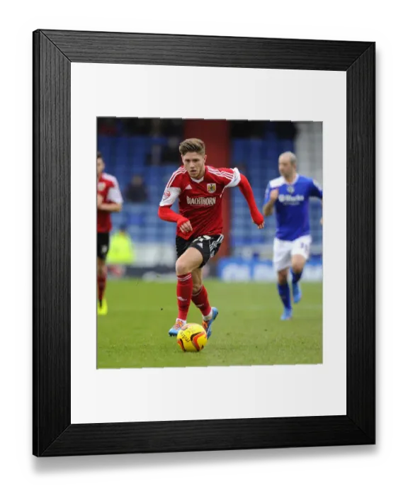 Framed Print : Bristol City's Wes Burns in Action against Oldham Athletic, February 8, 2014