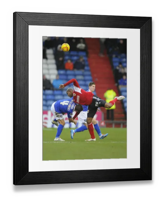 Framed Print : Bristol City's Marvin Elliott vs Oldham Athletic's James Wesolowski: Battle for the Ball in Oldham Athletic v Bristol City (Oldham v BCFC), Sky Bet League One Framed Print : Bristol City's Marvin Elliott vs Oldham Athletic's James Wesolowski: Battle for the Ball in Oldham Athletic v Bristol City (Oldham v BCFC), Sky Bet League One