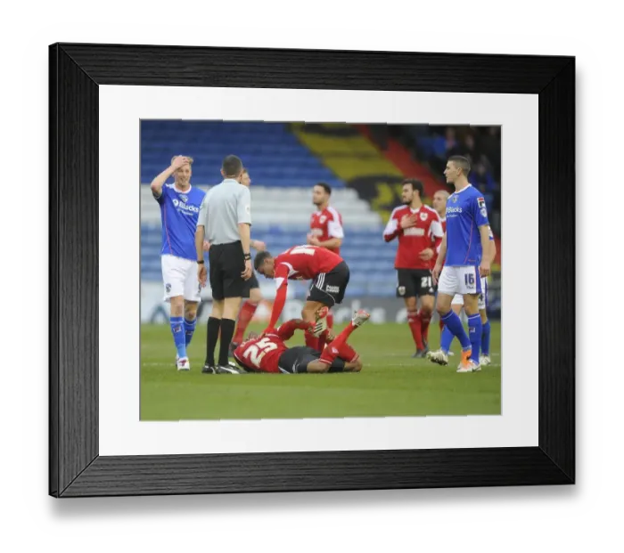 Framed Print : Marvin Elliott Suffers Injury in Oldham Athletic vs. Bristol City (Sky Bet League One) Framed Print : Marvin Elliott Suffers Injury in Oldham Athletic vs. Bristol City (Sky Bet League One)